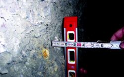 Severe concrete attack from biogenic sulfide corrosion in the head-space of  a grit chamber has removed up to 1½ inches of concrete. Photos: Tnemec