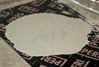 Self-consolidating concrete mixes are defined as having minimum spread diameters of 18 inches and maximum spreads of 30 inches, making it possible to place concrete under difficult conditions.
