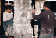 Vertical overlay concrete can be applied very thin or very thick. In either case it must bond well to the substrate, retain enough moisture to cure properly, and it mustnt sag or run