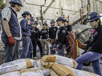 Participants of Concrete Preservation Institute field school help to preserve Alcatraz Island.