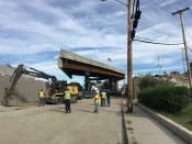 Installation of one of the bridge sections after assembly.