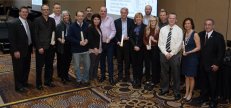 Representatives from Polycor, Twin City Tile and Marble, Italmarble Pocai, Tennessee Marble Company, Cutting Edge Stone, and Bonstone with Janina Mathiasz (Veronafiere), 2016 MIA President David Castellucci, and 2016 BSI President Aaron Hicken.