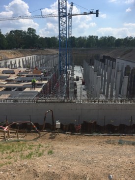 The basin is a watertight concrete structure that captures 20 million gallons of untreated wastewater during storm events.