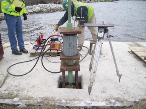 Since much of the spillway concrete was removed, the dam required measures to maintain its stability (resistance to movement due to water pressure). The solution consisted of rock anchors drilled through the dam and into the underlying bedrock. The weathered and fractured bedrock below the dam was improved via a foundation grouting program.