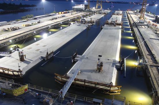Flooding of the Sparrows Point dry dock began in June 2014 and the first litter was towed to the Virginia jobsite to be immersed in the Elizabeth River. The last tunnel element was immersed on July 14, 2015, connecting the shorlines of Portsmouth and Norfolk.