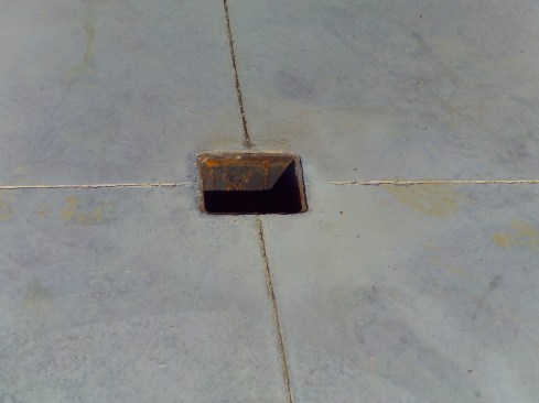 After the slab is placed, the cap is removed leaving the socket at the finished elevation.