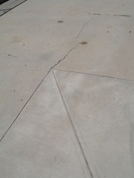 Discontinuing a joint at a T intersection often leads to a crack.