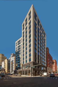 Exterior elements were reviewed and approved by the City of Detroit’s Historic District Commission. Black brick was cast directly into the panels for the lower two floors; a custom pigment mix and acid finish was used to make the lighter precast panels look like limestone. 