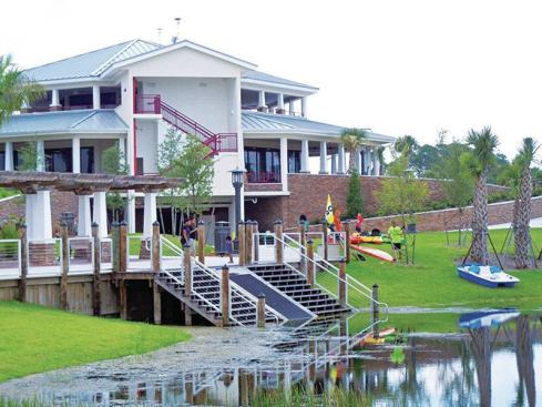 The new Royal Palm Beach Commons Park’s kayak launch is adjacent to the 17,000-square-foot sporting center building.
