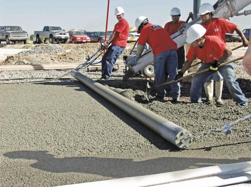 Properly proportioned pervious concrete, with the proper water content, flows easily down the truck chute.