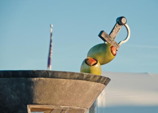 Two olives skewered on a sword toothpick were also part of the demo.
