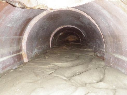 Over time, fine soil particles filtering into the pipe build up and reduce capacity. Injecting chemical grout structurally corrects pipe alignment and provides a permanent and positive joint seal on the outside of the pipe.