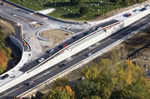 At one intersection the high groundwater elevation was estimated to be approximately 12 feet below the existing grade, so engineers were restricted to the depth they could lower the Keystone Parkway through lanes. Photos: American Structurepoint Inc.