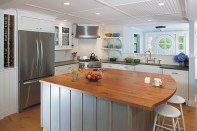 The client wanted a kitchen with a vintage feel that also fit with the ocean views of this Cape Cod vacation home.