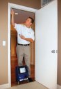 PRESTO CHANGE-O: Using HighMark Digital's measuring device, a technician scans nine points on the door frame, plus the placement of the hinges and locksets, and sends those measurements directly to a plant where a door is cut to those exact dimensions. Once the door is fabricated, it's delivered to the customer with the new hardware. An installer can remove the old door and hang the new one in minutes.