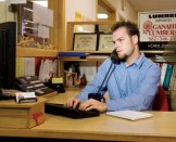 MULTITASKER: Chris Johnson, inside sales representative at Ganahl Lumber Co.'s yard in Los Alamitos, Calif., spends his day tracking current jobs, prospecting work, writing e-mails-and answering all incoming calls.