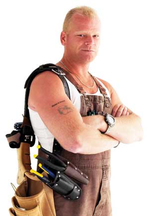 TATTOO U.: Mike Holmes shows his true colors with the "Make It Right" tattoo on his arm. That's no mere bit of whimsy. Rather, it's the brawny builder's personal mission statement as he exposes the work of bad contractors on his cable TV show.