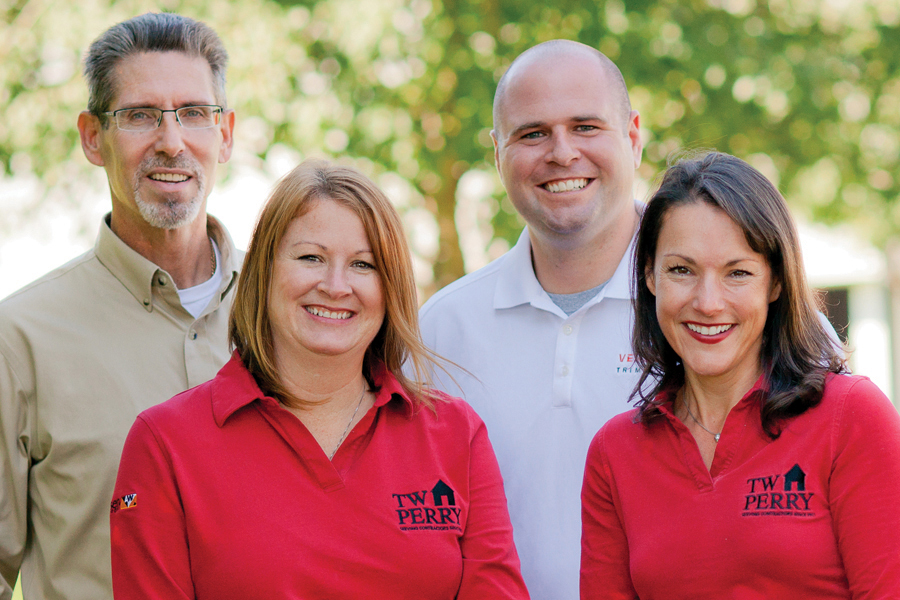 All Together Now: TW Perry believed so strongly in the value of bringing diverse interests to one place for its "All About the Home" show that it asked to have a contractor and manufacturer's rep take part in the Excellence Awards photo shoot. (David Barclay; Barclay Construction / Jennifer Purdy; TW Perry marketing manager / Matt Cullen; Versatex Trimboards / Tonya Farina; TW Perry director of business development)