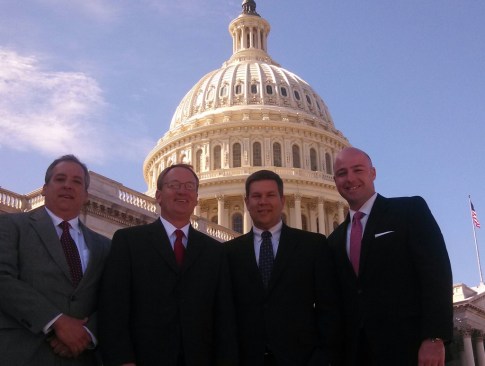 Jay Short, president of Short and Paulk, Chuck Bankston, president of Bankston Lumber, Jim Moody, president of Construction Suppliers Association, and Garrett Pepper, account executive at Federated Insurance, visited lawmakers in the U.S. Congress April 1 during the NLBMDA's annual legislative conference. Photo by Steve Campbell