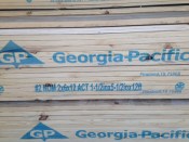 A pallet of lumber from GP shows nominal and actual sizes