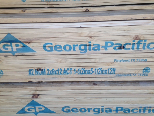 A pallet of lumber from GP shows nominal and actual sizes