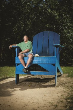 Bob Goebel sits in an oversized Adirondack chair he built at Sedgwick County Park Monday, Sept. 19, 2016 in Wichita, KS.
