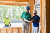 Millennials collaborating with builders