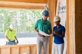 Millennials collaborating with builders