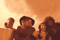 From left: Family friend Corey Kieslich joined Buzick employees Dwayne Lewis, Susan Elmore, and Troy Runner to suit up as four of Oz’s iconic characters.