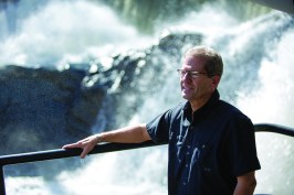 Lang Durfee, owner of Bethel Mills in Vermont, stands at the hydroelectric plant his grandfather built adjacent to Bethel Mills.