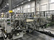 Many manufacturers, including MI Windows as shown here, are beginning to invest in robotic equipment for glass manufacturing lines in order to reduce human error.