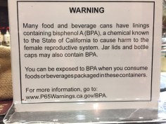 A Proposition 65 notice at a hotel gift shop in California