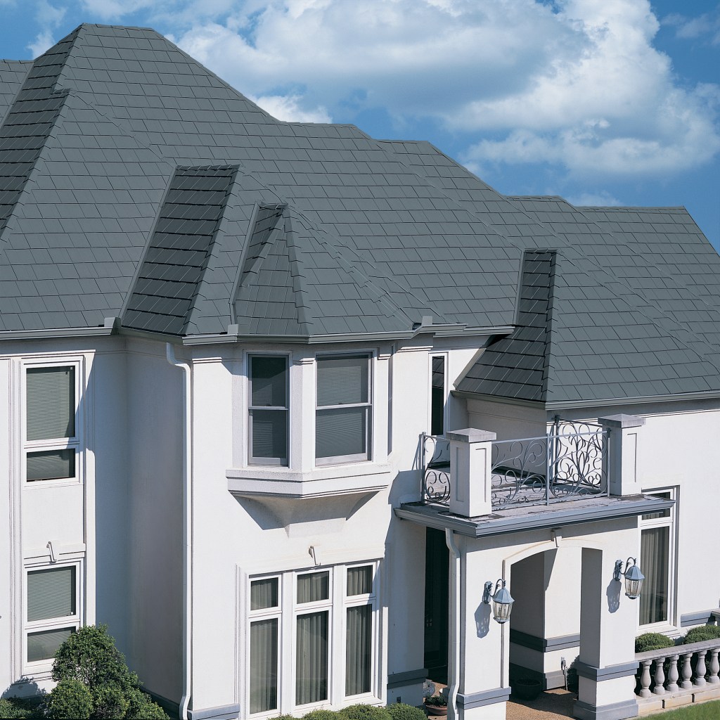MetalWorks is a line of steel shingles from TAMKO manufactured to look like other materials, such as tile or slate. The galvanized shingles get a high-performance finish and come with a 50-year guarantee.