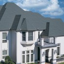 MetalWorks is a line of steel shingles from TAMKO manufactured to look like other materials, such as tile or slate. The galvanized shingles get a high-performance finish and come with a 50-year guarantee.
