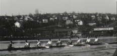 The University of Washington rowing crew, gold-medal winners in the 1936 Olympic Games, practice on Seattle's Lake Union near Dunn Lumber's yard. Dunn has produced a new documentary about that team.