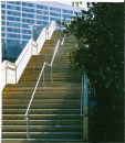 The landing framing, decking, stringers, risers, and treads on this 2001 project were all pre-cut off-site and assembled on site to overcome limited security and the lack of electrical power.