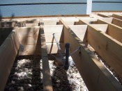 The gas pipe stub needs to extend high enough above the finished decking so that a minimum of 2 inches of unthreaded pipe is exposed. On a low deck like this, it is a good idea to paint the pipe prior to decking installation.