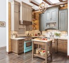 Wellborn Cabinets’ Gauntlet, Shale, and Saddle stains are featured on these modern cabinets.