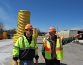 Tom Pachinger (right), project manager for the $30 million upgrade, walks through the plan with Ken McDonald, plant manager for Georgia-Pacific’s Rome Lumber facility.