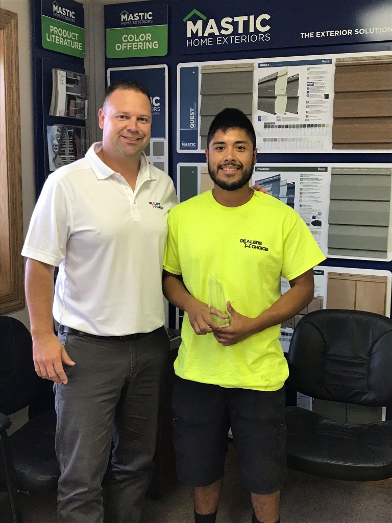 Dealers Choice District Manager Joe Noreiko presents the first Husky Clipper Award to driver Angel Escandon at our Kearney, Nebraska branch.  The Husky Clipper Award is given to employees that go above and beyond in their efforts and dedication to Dealers Choice.