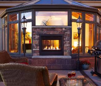 The Twilight Modern double-sided enclosed fireplace from Heat & Glow allows builders to add an indoor hearth while creating a focal point for an outdoor living space without additional cost. And thanks to a steel combustion chamber that vents the unit, windows can be placed directly above the hearth. www.hearthnhome.com