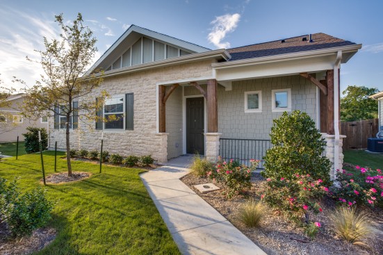 The exterior elevations and landscape features of NexMetro's Avilla Homes, including this community in Plano, Tex., are modeled after the natural surroundings and local architectural styles.