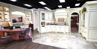 Both plain and fancy cabinets are displayed in the kitchen part of the showroom.