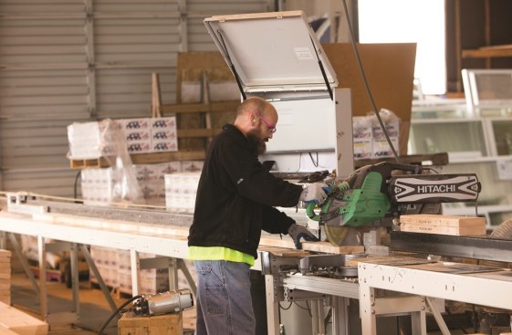 Ready-Frame sawyer Randy Gomez works on the system at the Tacoma plant. Ready-Frame is designed to simplify and streamline the framing process.