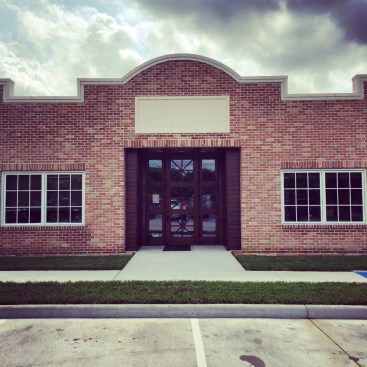 The building's front facade echoes the grocery store the family first opened on the original site in the 1890s.