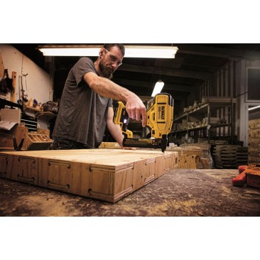 The DeWalt DCN681D1 Cordless Stapler in use in the shop.