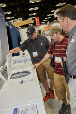 Do it Best members examine the new appliances lineup at the group's Spring Market.