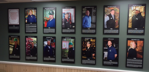 A wall at Hancock Lumber's HQ recognizes the employees of the year for each branch
