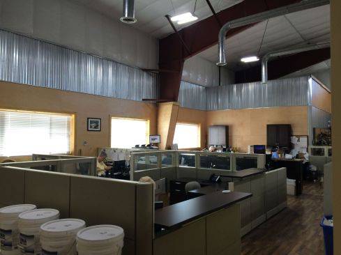 The new offices at Howe Lumber feature more open work spaces instead of cubicles in an effort to create more collaboration among the team and break down silos.