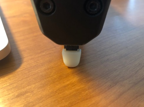 This is the nose that comes with the stapler. It is rounded and hard, making it prone to slipping on material.